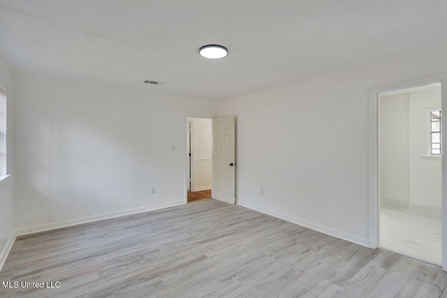 empty room featuring light wood-type flooring