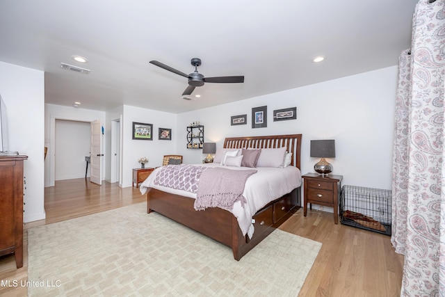 bedroom featuring a ceiling fan, recessed lighting, visible vents, and light wood finished floors