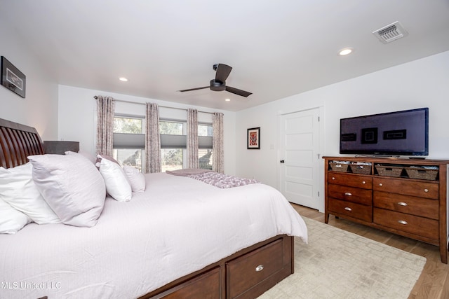 bedroom with ceiling fan, light wood-type flooring, visible vents, and recessed lighting