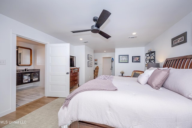 bedroom with recessed lighting, visible vents, ceiling fan, and light wood finished floors