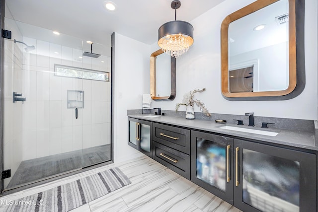 full bathroom featuring double vanity, a sink, visible vents, and a shower stall