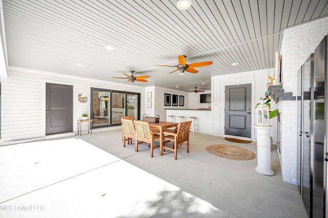 view of patio featuring a ceiling fan