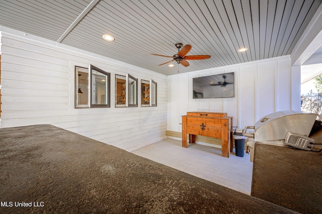 exterior space with ceiling fan and area for grilling