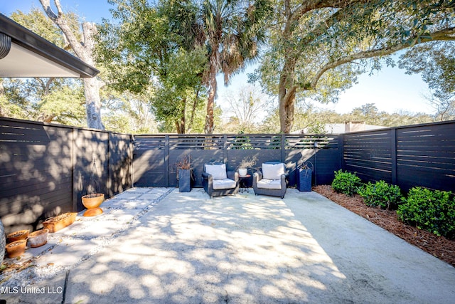 view of patio featuring a fenced backyard