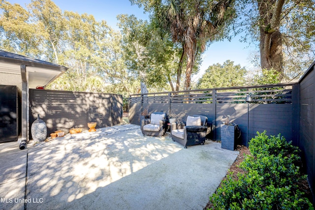 view of patio featuring a fenced backyard