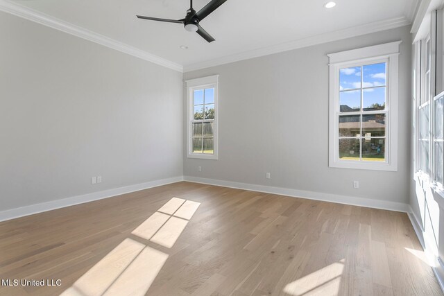 unfurnished room featuring light hardwood / wood-style flooring, ceiling fan, and crown molding