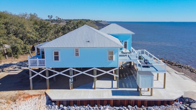6717 Belle Fontaine Dr, Ocean Springs, MS 39564 - rear view of house featuring a water view and metal roof