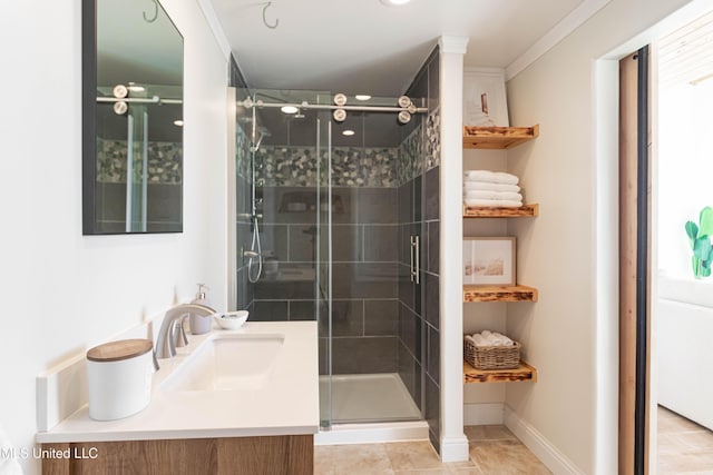 6717 Belle Fontaine Dr, Ocean Springs, MS 39564 - bathroom with vanity, baseboards, tile patterned flooring, and a stall shower