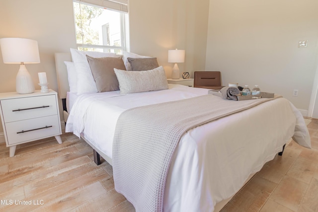 6717 Belle Fontaine Dr, Ocean Springs, MS 39564 - bedroom with light wood finished floors