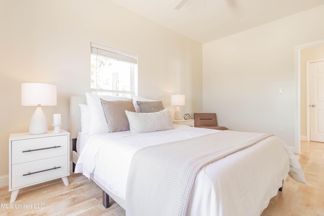 6717 Belle Fontaine Dr, Ocean Springs, MS 39564 - bedroom featuring light wood-type flooring, baseboards, and ceiling fan