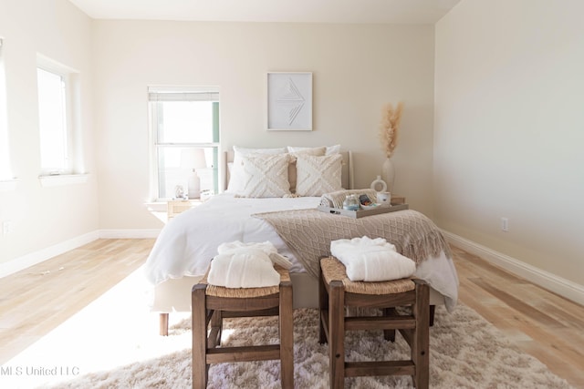 6717 Belle Fontaine Dr, Ocean Springs, MS 39564 - bedroom featuring baseboards and light wood-type flooring
