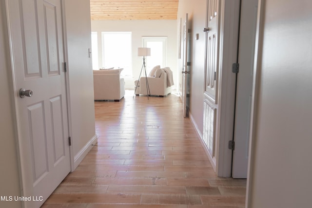 6717 Belle Fontaine Dr, Ocean Springs, MS 39564 - corridor with light wood-type flooring, baseboards, and wood ceiling