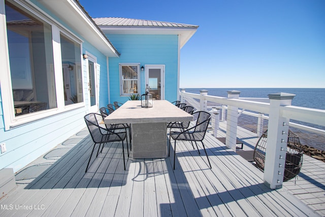 6717 Belle Fontaine Dr, Ocean Springs, MS 39564 - wooden deck featuring a water view and outdoor dining area