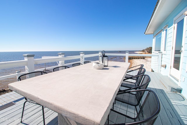 6717 Belle Fontaine Dr, Ocean Springs, MS 39564 - wooden terrace with outdoor dining space and a water view