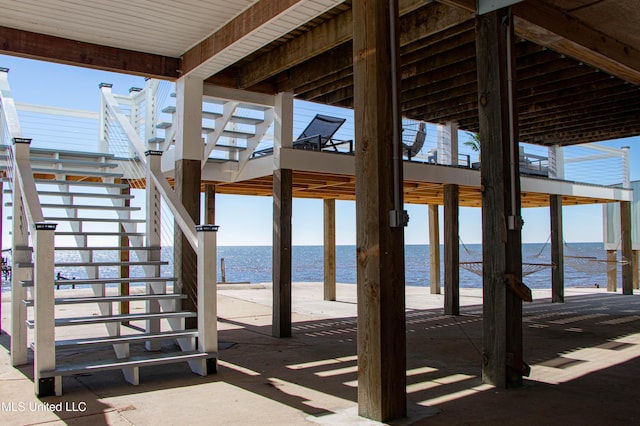 6717 Belle Fontaine Dr, Ocean Springs, MS 39564 - view of patio / terrace with stairway and a water view