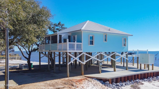 6717 Belle Fontaine Dr, Ocean Springs, MS 39564 - rear view of property with a water view and metal roof