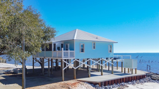 6717 Belle Fontaine Dr, Ocean Springs, MS 39564 - back of property featuring a water view and metal roof