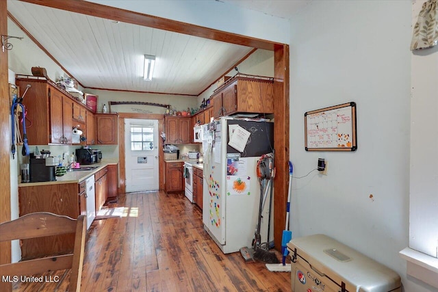 kitchen featuring crown molding, white appliances, dark wood-type flooring, and wood ceiling