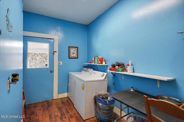 washroom with dark hardwood / wood-style floors and separate washer and dryer