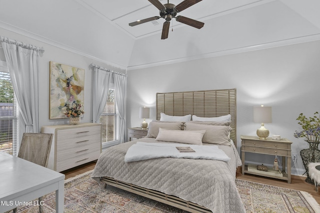 bedroom with ornamental molding, dark hardwood / wood-style floors, ceiling fan, and lofted ceiling