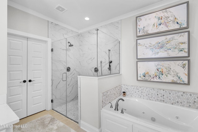 bathroom featuring separate shower and tub and crown molding