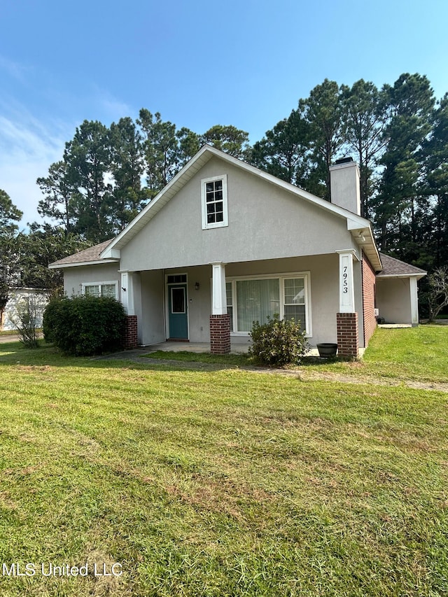 front facade with a front lawn