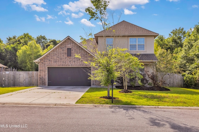 832 Reunion Place Cir, Biloxi, MS 39532 - traditional-style house with concrete driveway, stucco siding, a shingled roof, and brick siding