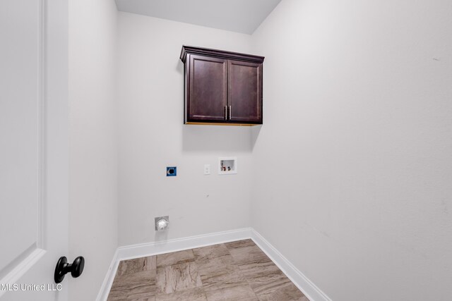 832 Reunion Place Cir, Biloxi, MS 39532 - laundry room with hookup for an electric dryer, baseboards, hookup for a washing machine, cabinet space, and light marble finish floors
