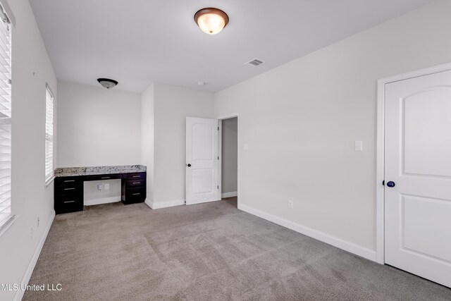 832 Reunion Place Cir, Biloxi, MS 39532 - unfurnished bedroom featuring light carpet and baseboards