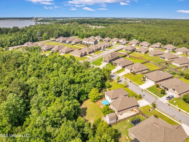 832 Reunion Place Cir, Biloxi, MS 39532 - aerial perspective of suburban area featuring a forest and a large body of water