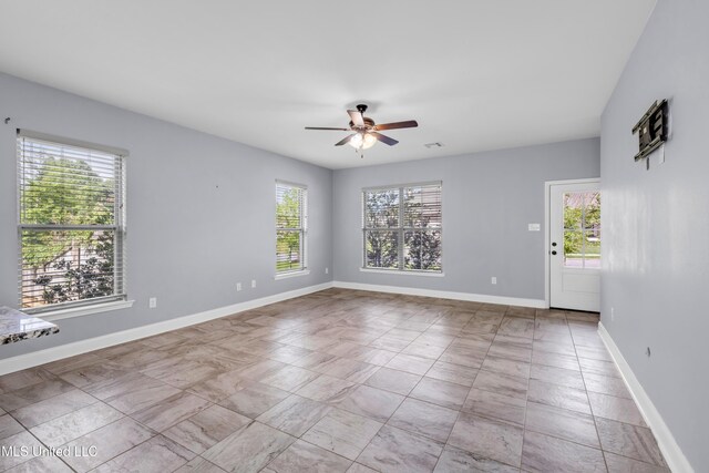 832 Reunion Place Cir, Biloxi, MS 39532 - unfurnished room featuring a ceiling fan and baseboards