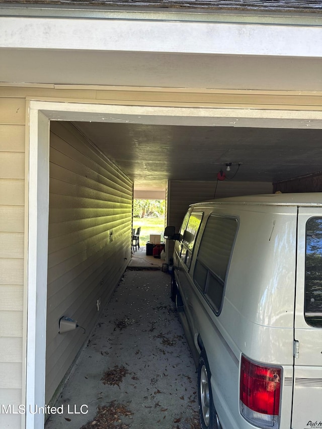 garage with a carport