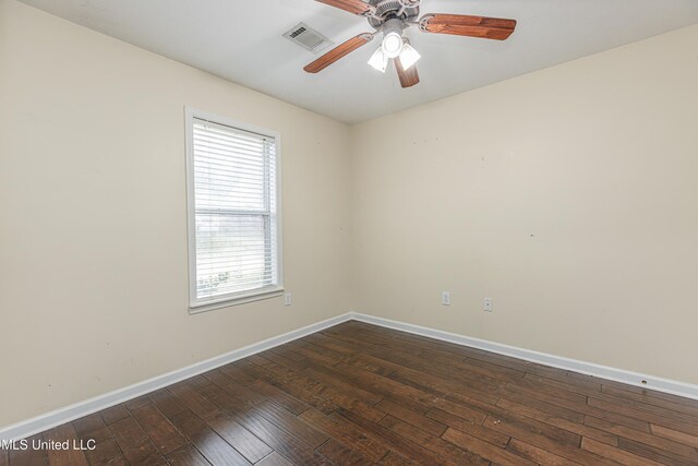 159 Basswood Cir, Brandon, MS 39047 - spare room featuring ceiling fan and dark wood-style flooring