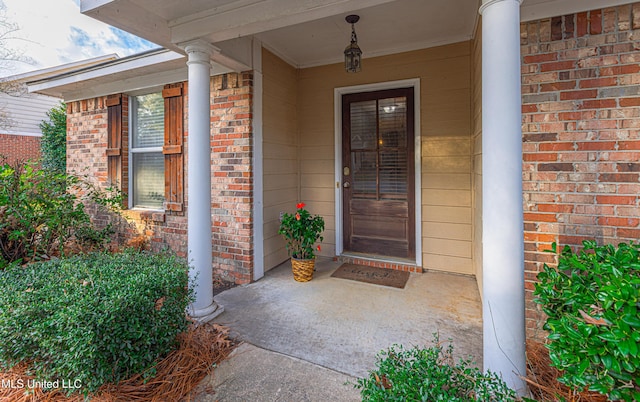 159 Basswood Cir, Brandon, MS 39047 - property entrance featuring brick siding and covered porch