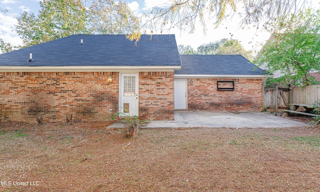 rear view of property with a patio area