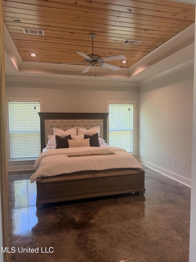 bedroom featuring wooden ceiling, baseboards, a tray ceiling, and visible vents