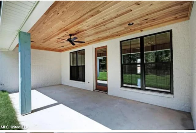 view of patio with a ceiling fan