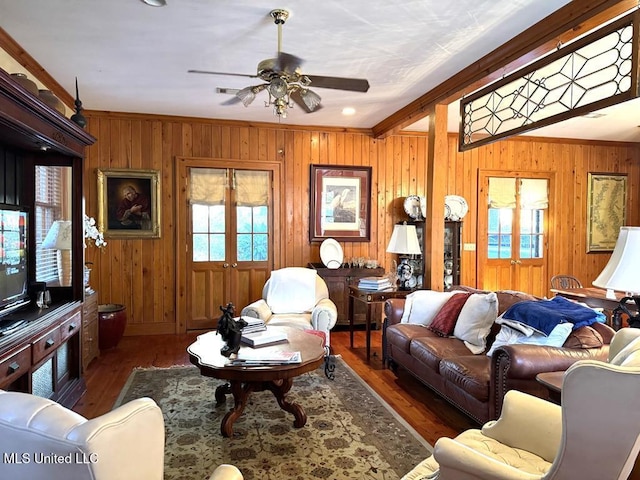 48 Fairway Dr, Natchez, MS 39120 - living room featuring crown molding, ceiling fan, dark hardwood / wood-style flooring, and wood walls