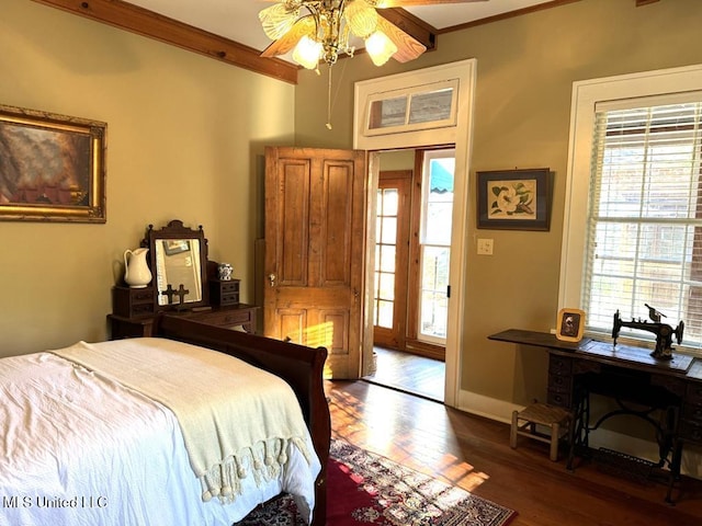 48 Fairway Dr, Natchez, MS 39120 - bedroom featuring dark wood-type flooring and ornamental molding