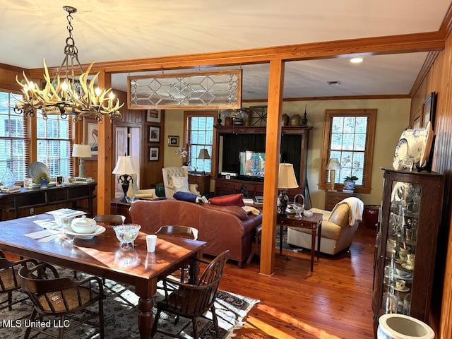 48 Fairway Dr, Natchez, MS 39120 - dining room with crown molding, hardwood / wood-style floors, and a chandelier