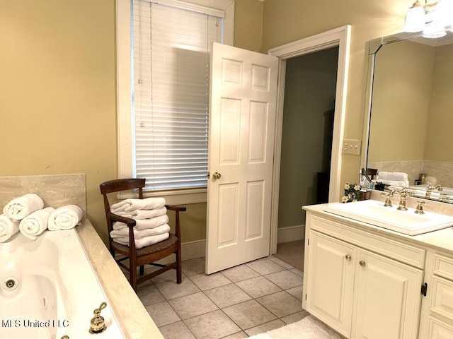 48 Fairway Dr, Natchez, MS 39120 - bathroom featuring tile patterned floors, a bathing tub, and vanity