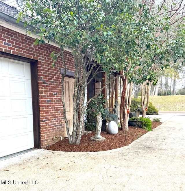 48 Fairway Dr, Natchez, MS 39120 - doorway to property with a garage