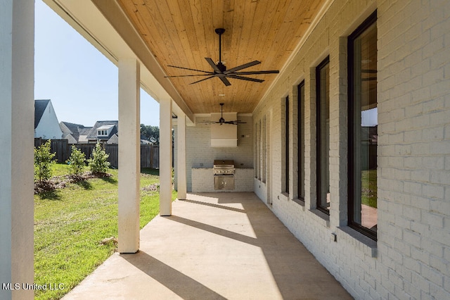 view of patio / terrace featuring grilling area, area for grilling, and ceiling fan