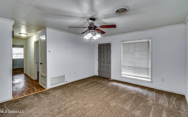 204 Turtle Creek Dr, Brandon, MS 39047 - carpeted spare room featuring ornamental molding, a ceiling fan, baseboards, and a textured ceiling