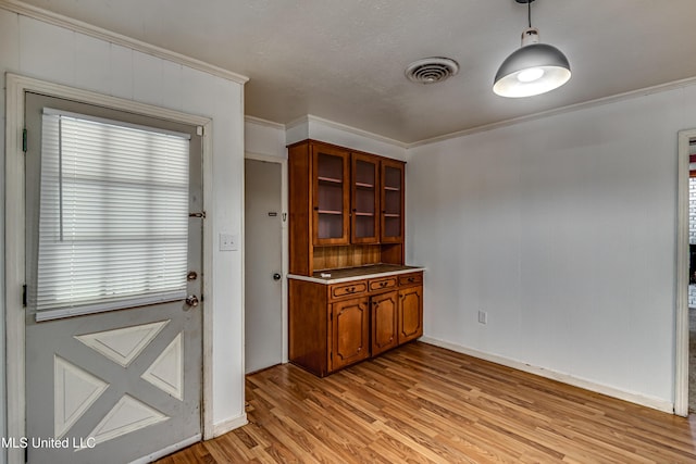 204 Turtle Creek Dr, Brandon, MS 39047 - unfurnished dining area with light wood-style flooring, crown molding, and baseboards