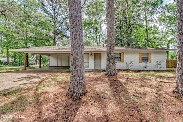 204 Turtle Creek Dr, Brandon, MS 39047 - ranch-style house with brick siding, driveway, and a carport