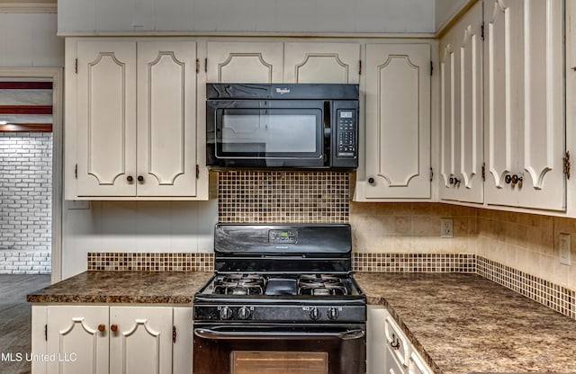 204 Turtle Creek Dr, Brandon, MS 39047 - kitchen featuring black appliances, dark countertops, tasteful backsplash, and white cabinetry