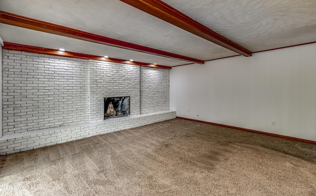 204 Turtle Creek Dr, Brandon, MS 39047 - unfurnished living room featuring beamed ceiling, carpet floors, a textured ceiling, a brick fireplace, and brick wall