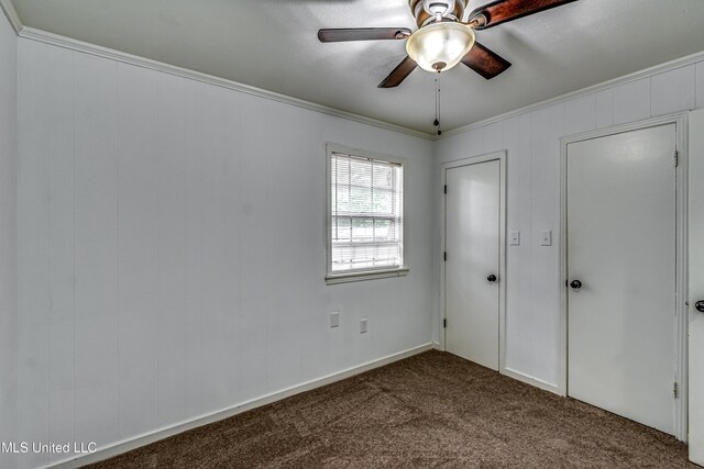 204 Turtle Creek Dr, Brandon, MS 39047 - unfurnished bedroom featuring dark colored carpet, crown molding, and ceiling fan