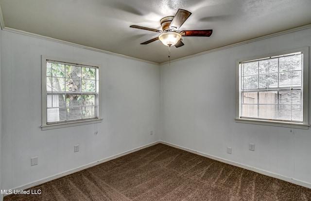 204 Turtle Creek Dr, Brandon, MS 39047 - spare room featuring a ceiling fan, dark colored carpet, crown molding, and baseboards
